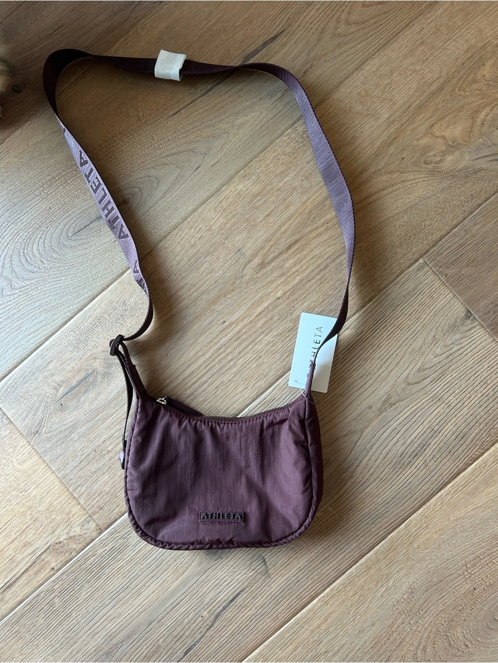 Athleta Plum Crossbody Bag with Branded Strap